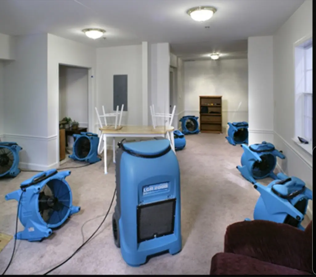 Air movers and dehumidifier setup for Water Damage Restoration in White City
